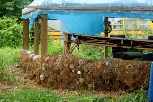 The schoolhouse dome received an update, walls have begun being constructed out of bottle bricks and an adobe-like mixture.